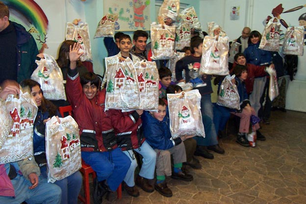 Giving Christmas gifts at an orphanage
