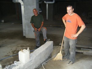 Ludmil reviewing the plasterwork in the Centre basement - August 2010