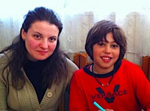 Traian with teacher Stephi - Literacy classes  Dec 2011